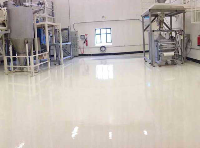 Epoxy flooring systems for industrial and commercial spaces